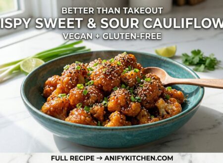 Crispy sweet and sour cauliflower in bowl with glossy sauce sesame seeds and green onions vegan healthy recipe