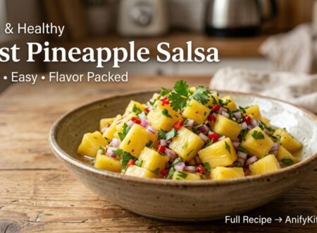 Best pineapple salsa recipe in a bowl with fresh pineapple, onion, chili, and cilantro on a wooden table